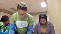 Volunteers cooking