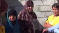 Latifa with her grandchildren