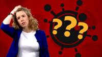 Reporter stands next to question mark