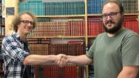 Video of new owners of bookshop they won in a raffle