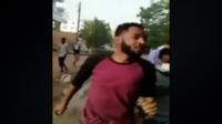 Man running from gunshots