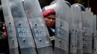 A riot policeman during clashes with university students protesting over a controversial reform to the pension plans of the Nicaraguan Social Security Institute in Managua 20th April 2018