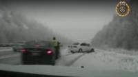 Car about to hit Utah trooper Sgt Cade Brenchley