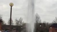 Dramatic video shows the leak in the middle of a residential street in Milton Keynes.