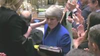 Theresa May leaves the Commons