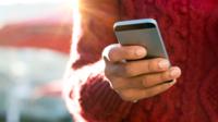 Person using mobile phone