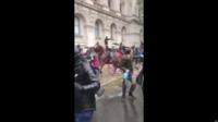 A police horse bolts during anti-racism protest in London