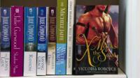 romantic fiction on a shelf
