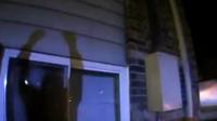 Shadow of police officer's arms