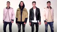 The four Dulatov brothers modelling menswear
