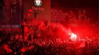 Celebrating crowds and flares