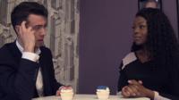 Man and woman sat at table