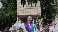 A woman marching.