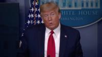 President Donald Trump addresses reporters