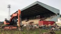 A service is held at Kettering Town's derelict former ground before its demolition.