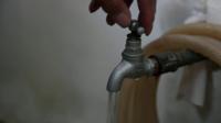 Running water from a tap