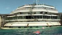 Still from footage released by Costa Conciere shows the Costa Concordia wreck, as viewed from a boat