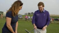 BBC Scotland's Catriona Shearer is given a golf lesson from Stephen Gallacher