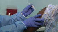 Man receiving Ebola vaccine