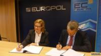 Symantec representative signs an agreement of understanding with Europol