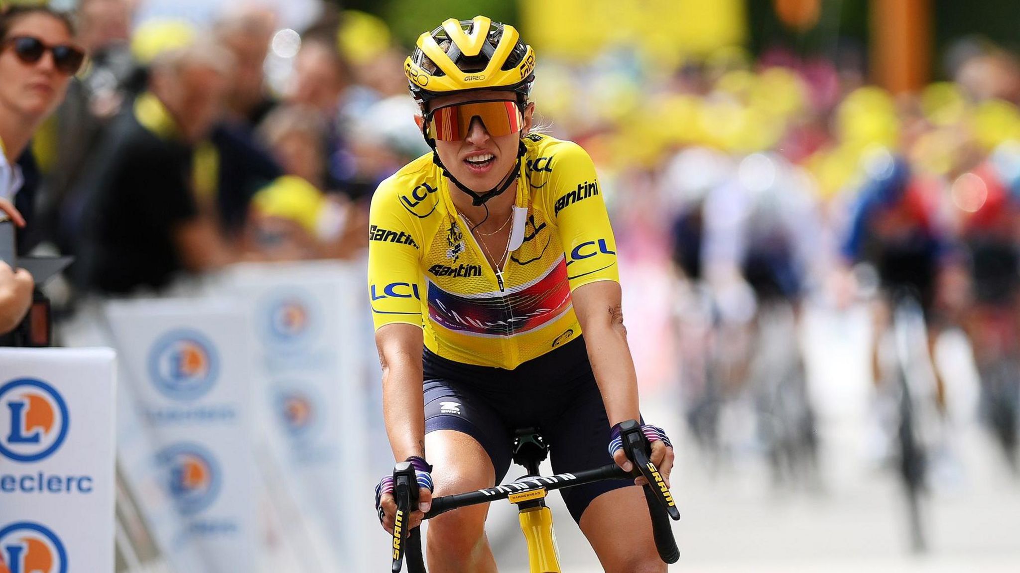 Yellow jersey holder Katarzyna Niewiadoma crosses the line on the seventh stage of the 2024 Tour de France Femmes