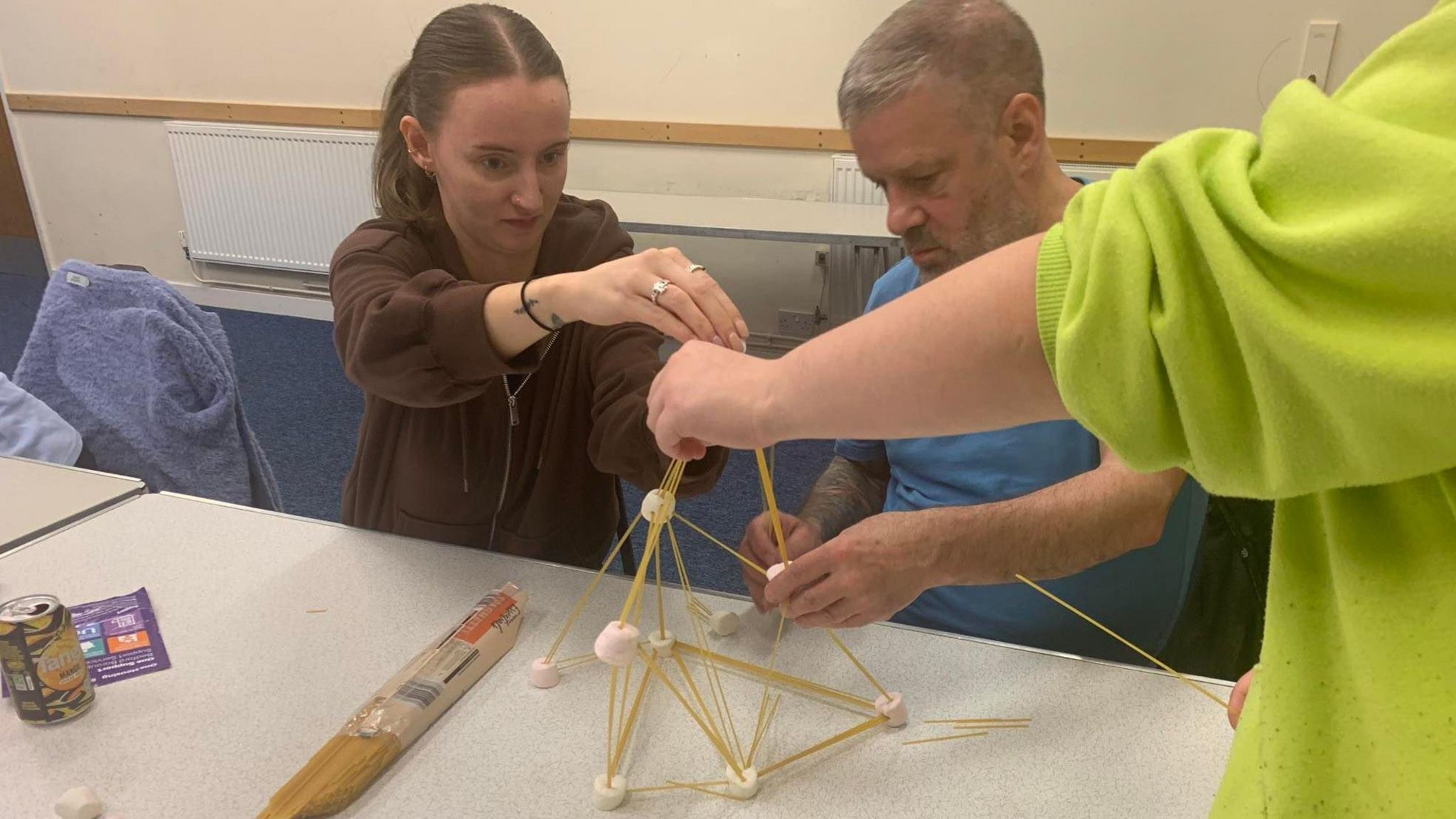 People taking part in an activity at B Positive Bedford