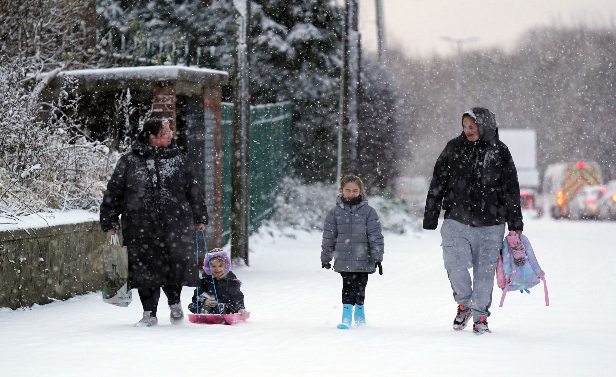 People in the snow in Gateshead on 1 December 2023