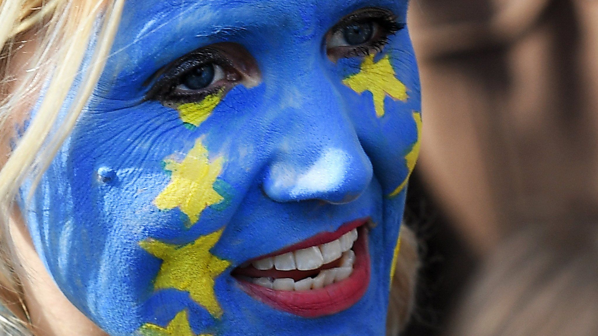 Woman with EU painted face