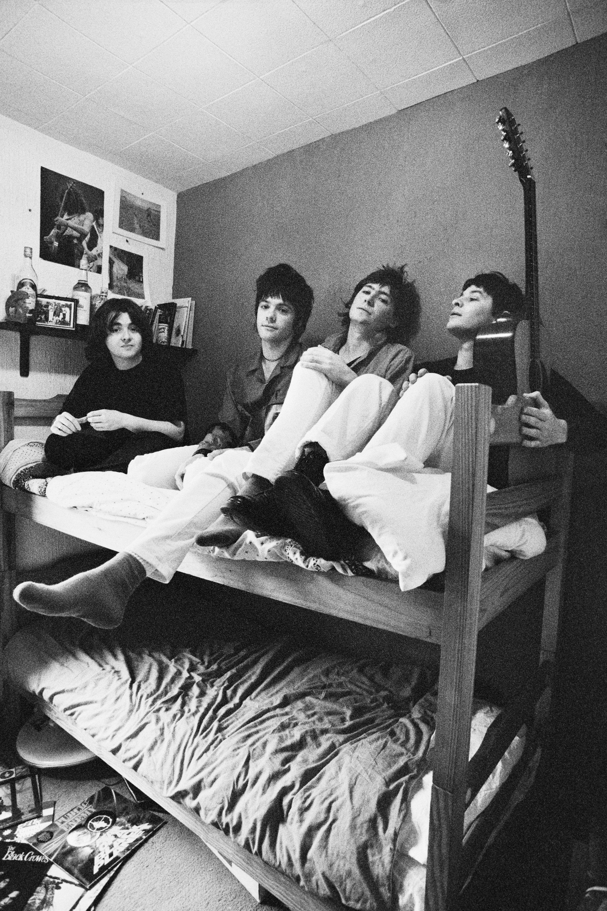 Manic Street Preachers on a bunk bed together in the early 1990s
