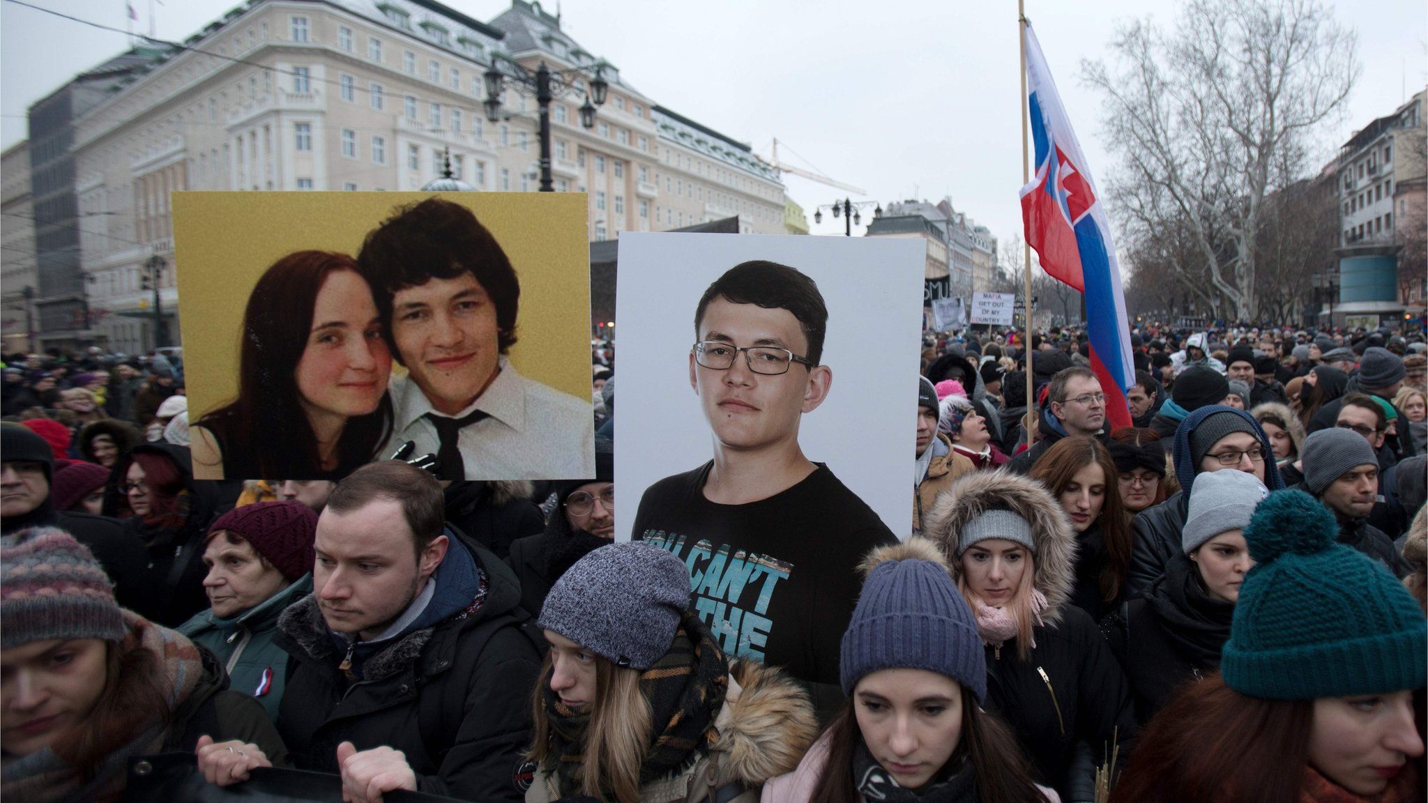 People hold portraits of murdered Slovak journalist Jan Kuciak and his girlfriend Martina Kusnirova during a silent protest march in their memory on March 2, 2018 in Bratislava, Slovakia