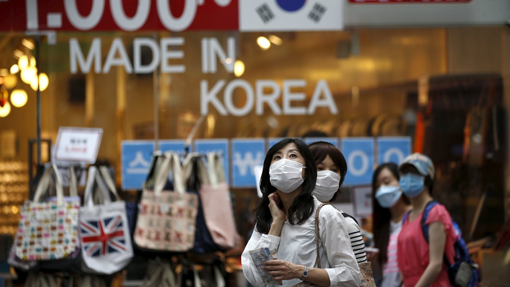 Shoppers with face masks