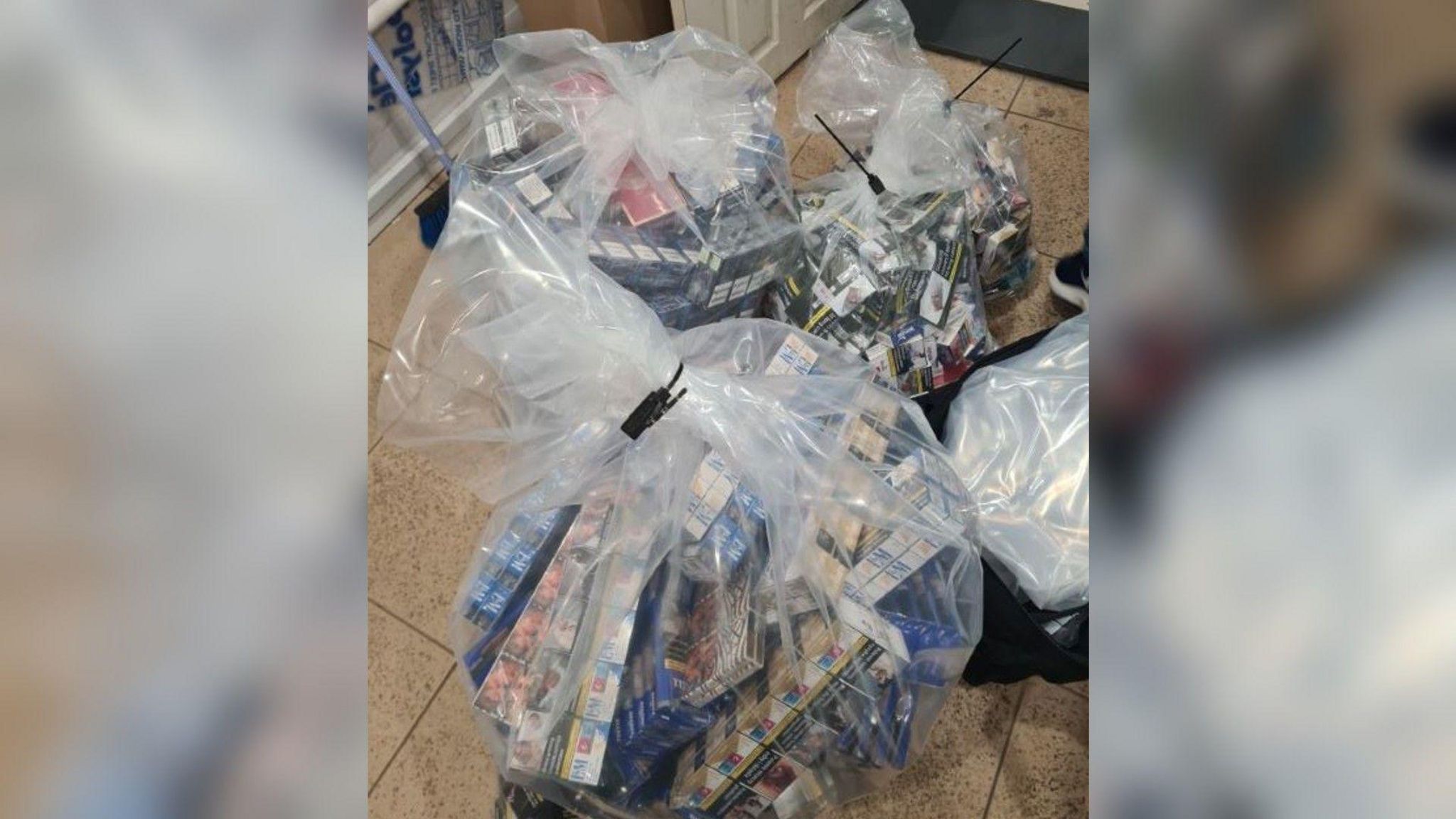 Plastic sacks containing cigarettes seized from a shop in Spalding