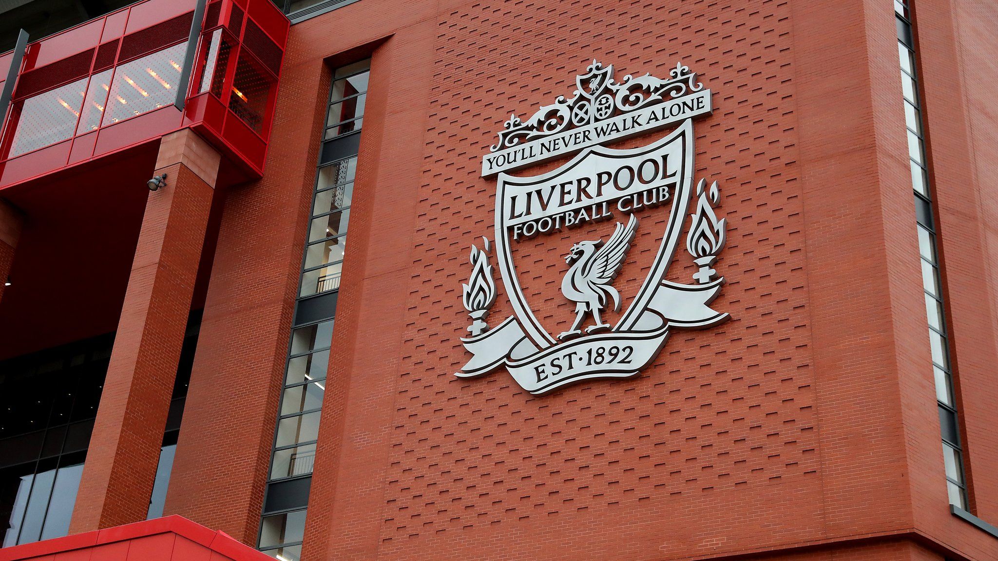 The Liverpool badge on the Anfield Main Stand