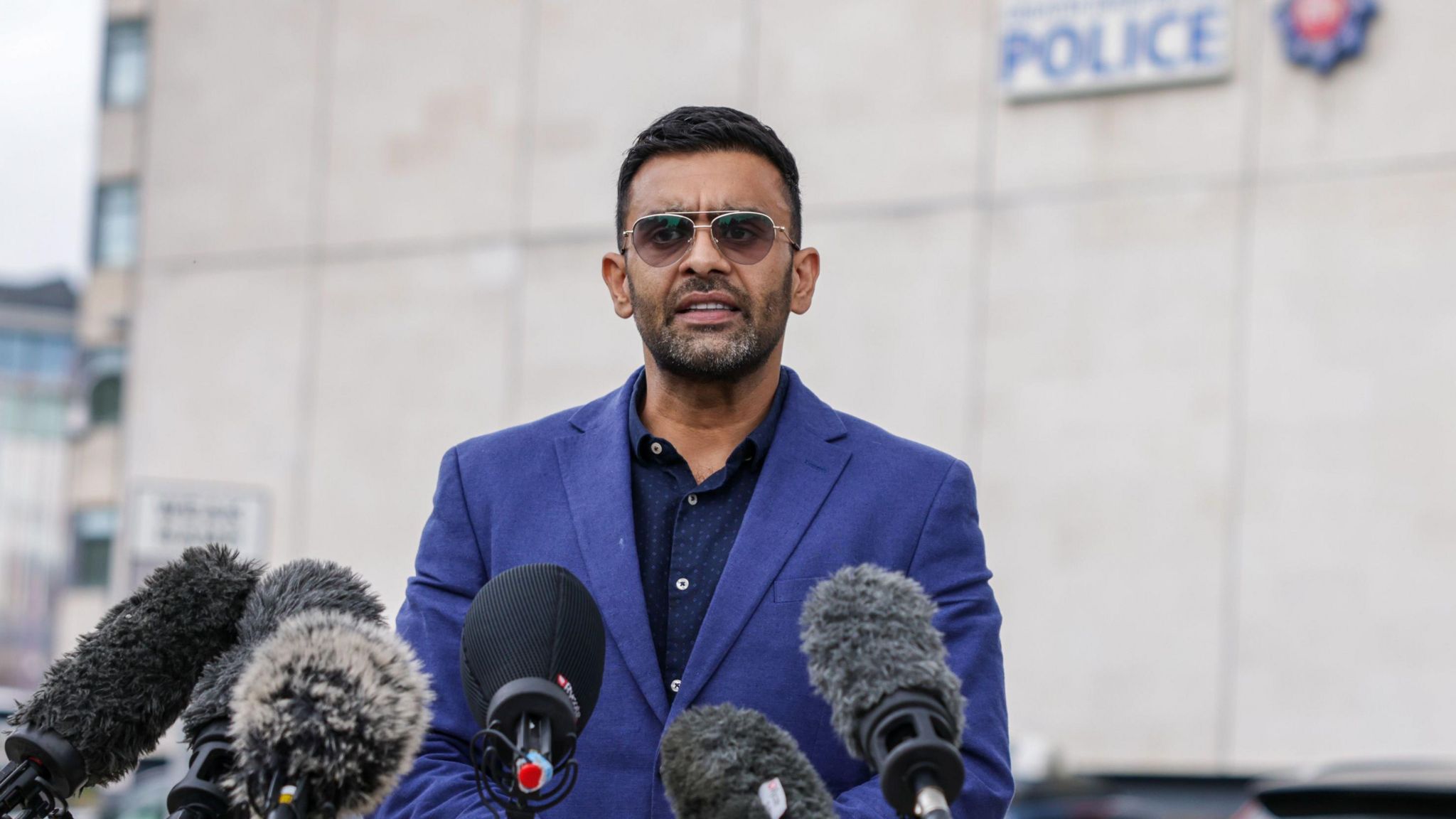 Solicitor Akhmed Yakoob speaks to the media outside Rochdale Police station in Greater Manchester.