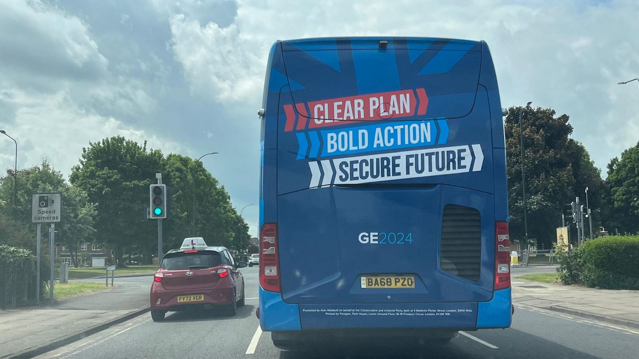 The Conservative campaign bus at traffic lights in Grimsby