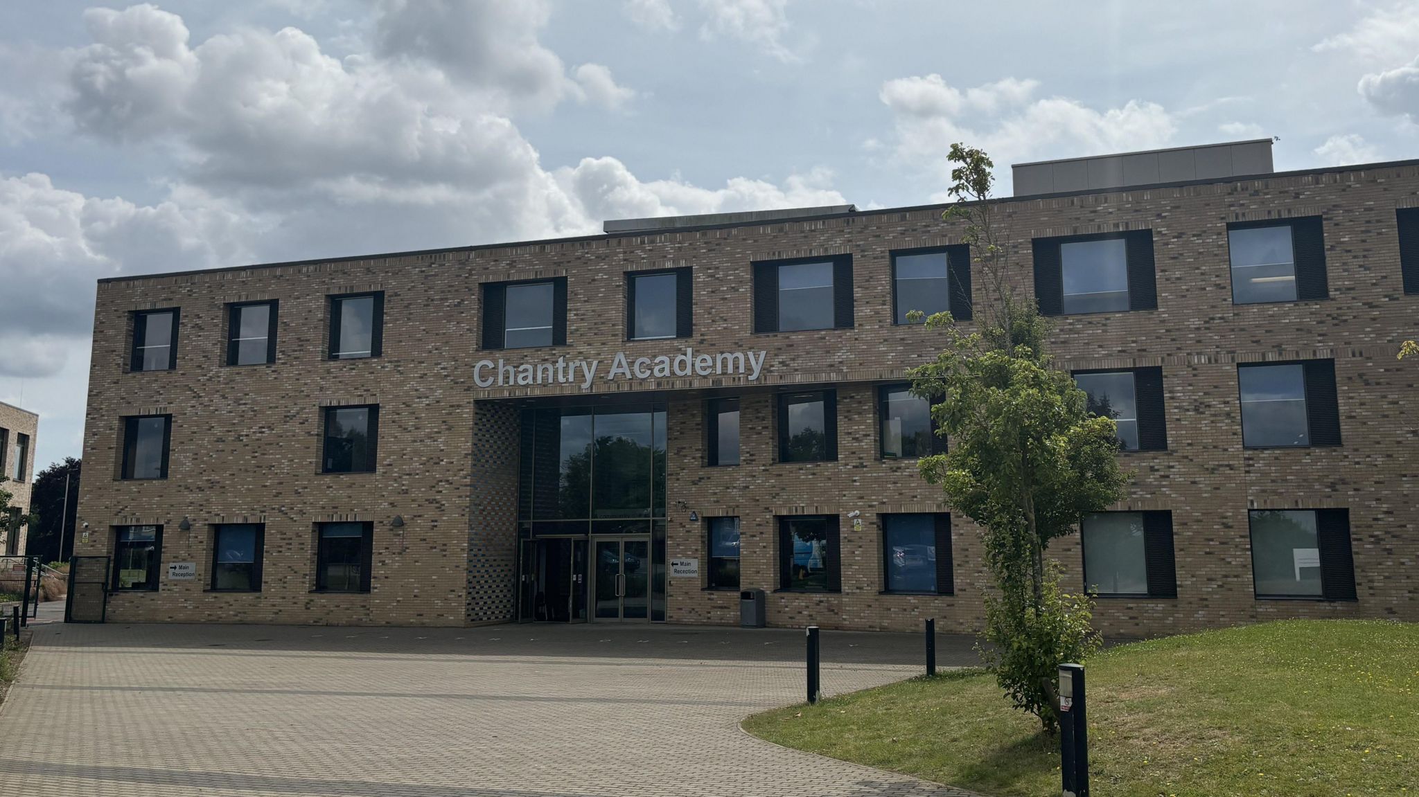 The main entrance to Chantry Academy, a three-storey brick building