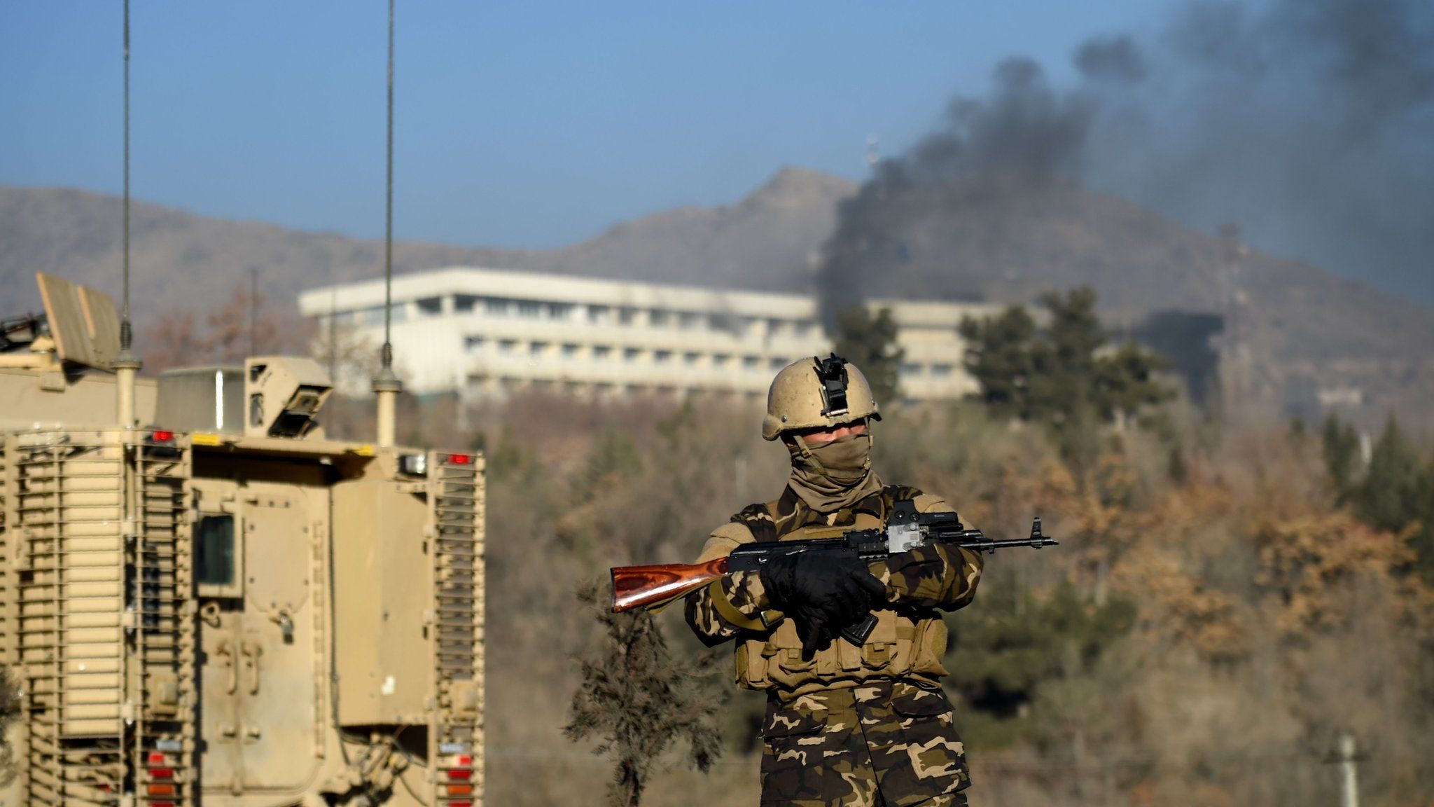 An Afghan soldier near the Intercontinental Hotel during the siege on 21 January.