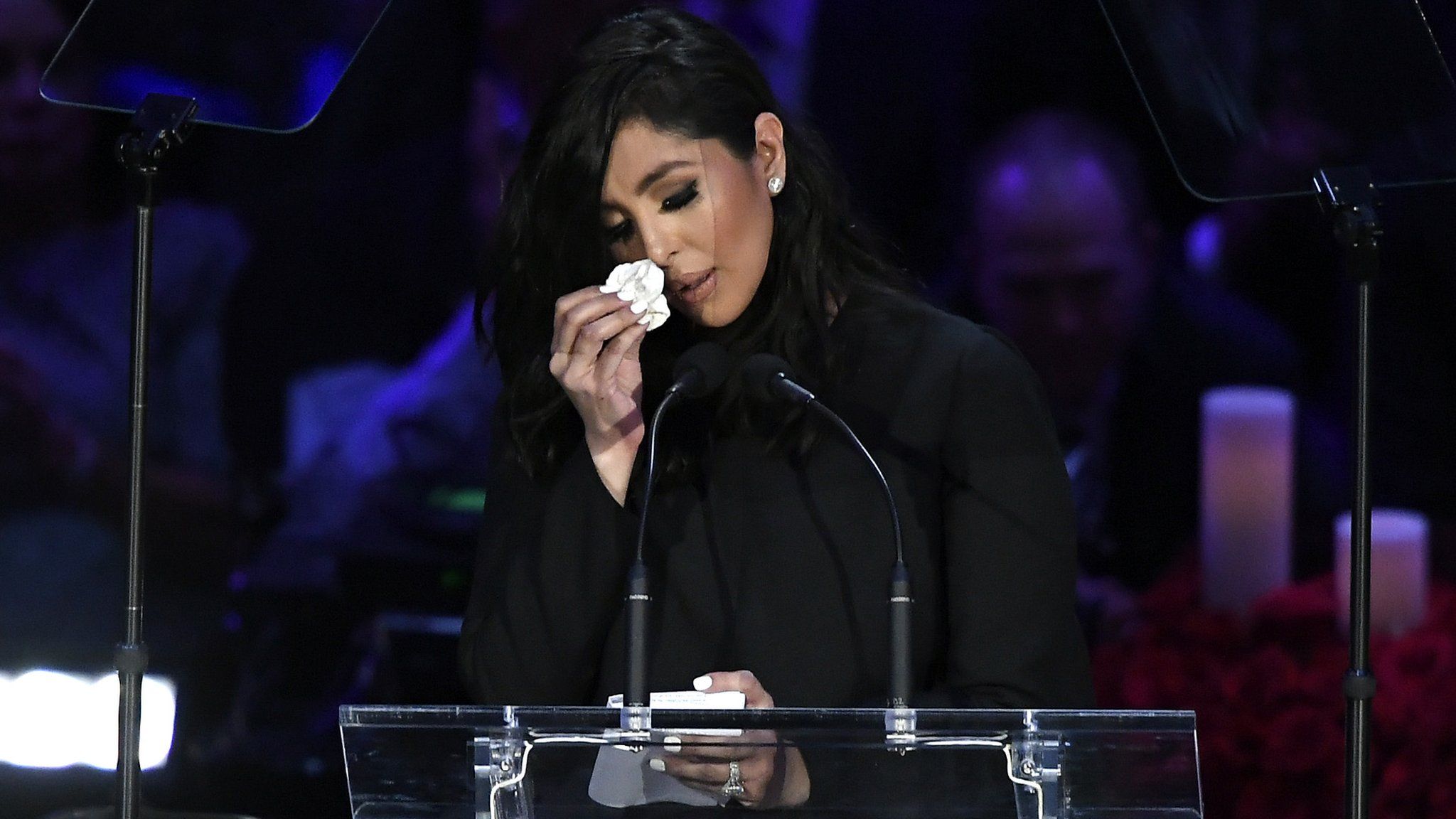 Vanessa Bryant wipes a tear as she delivers a speech at the memorial for her late husband Kobe Bryant and daughter Gianna