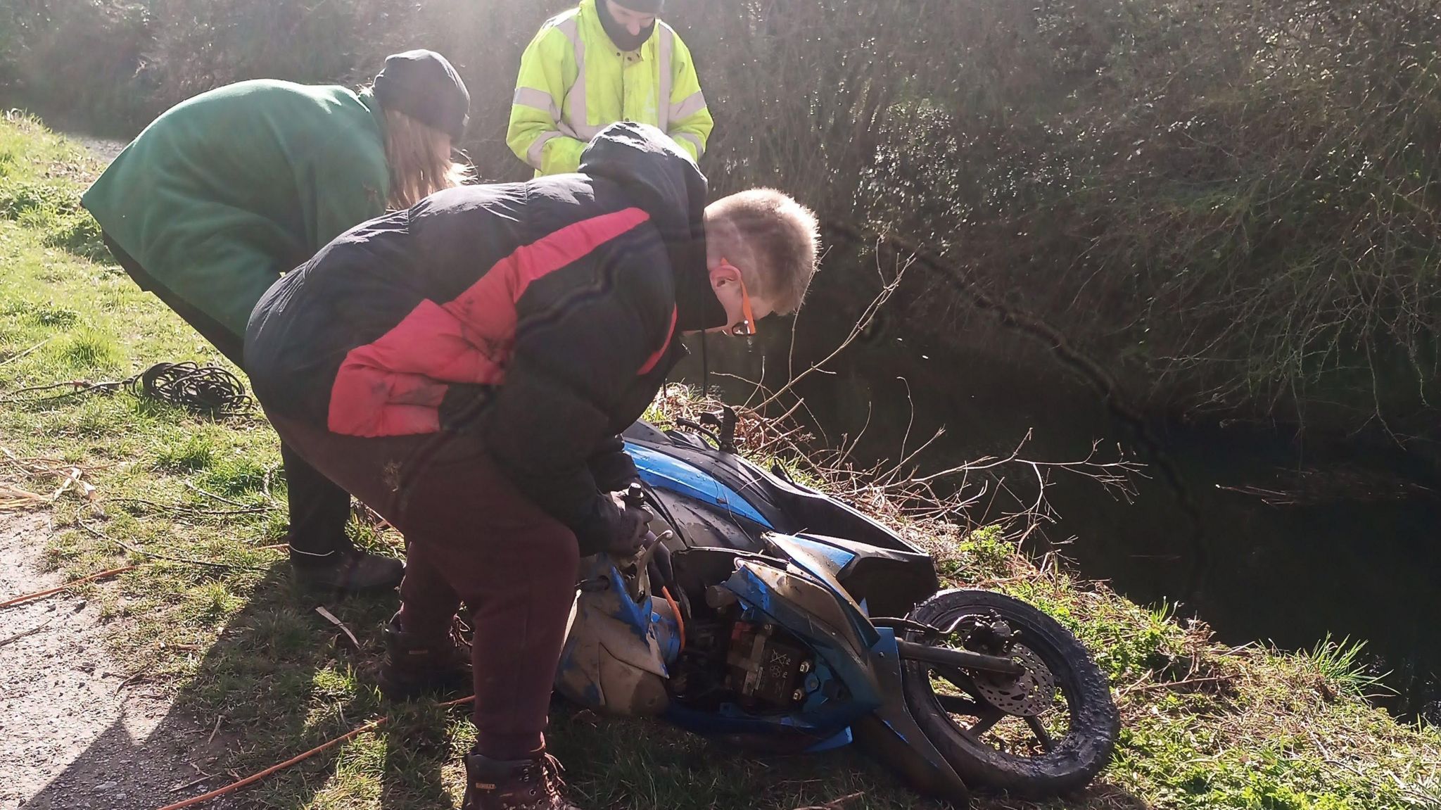Motorcycle pulled from drain