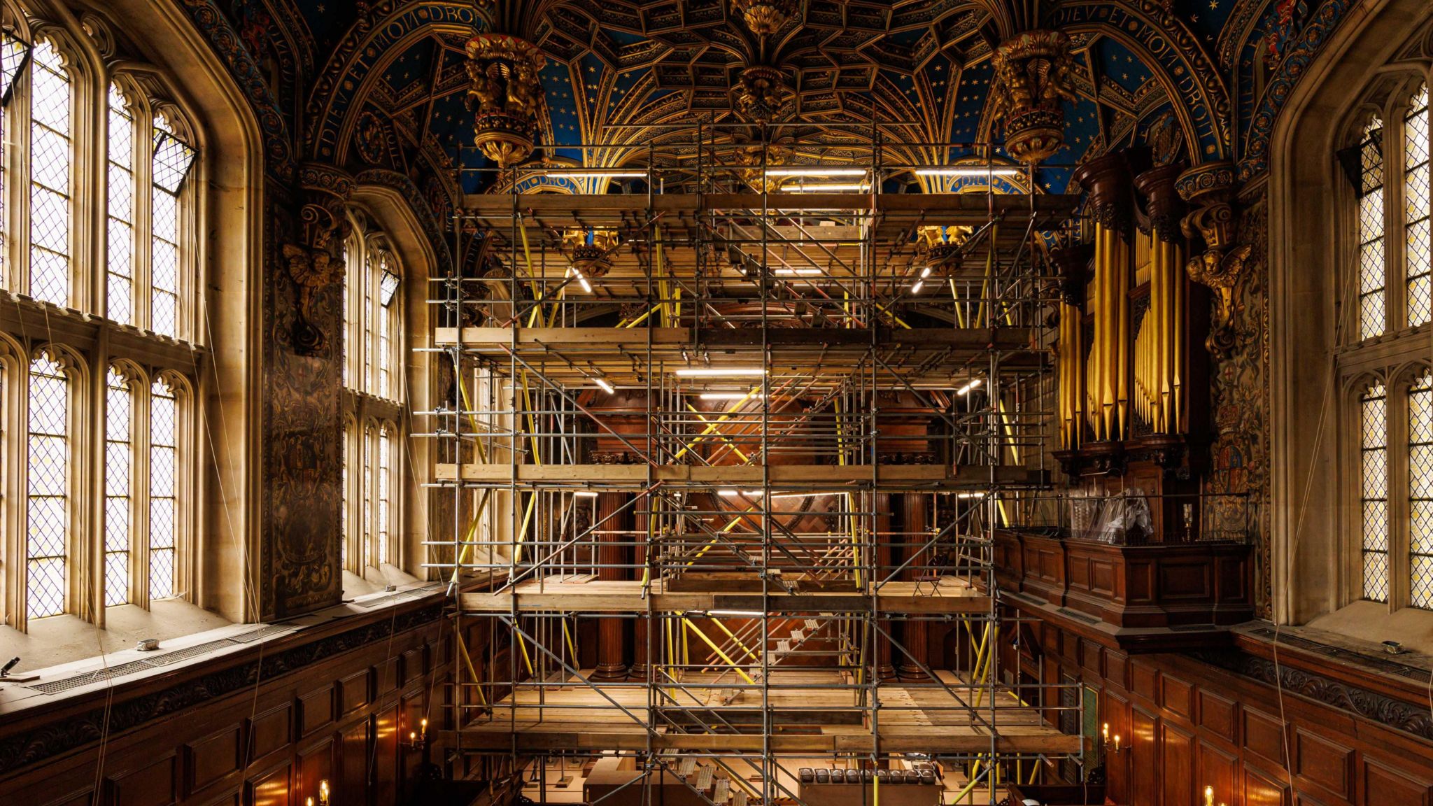 Scaffolding rises up to the vaulted roof of the Hampton Court chapel