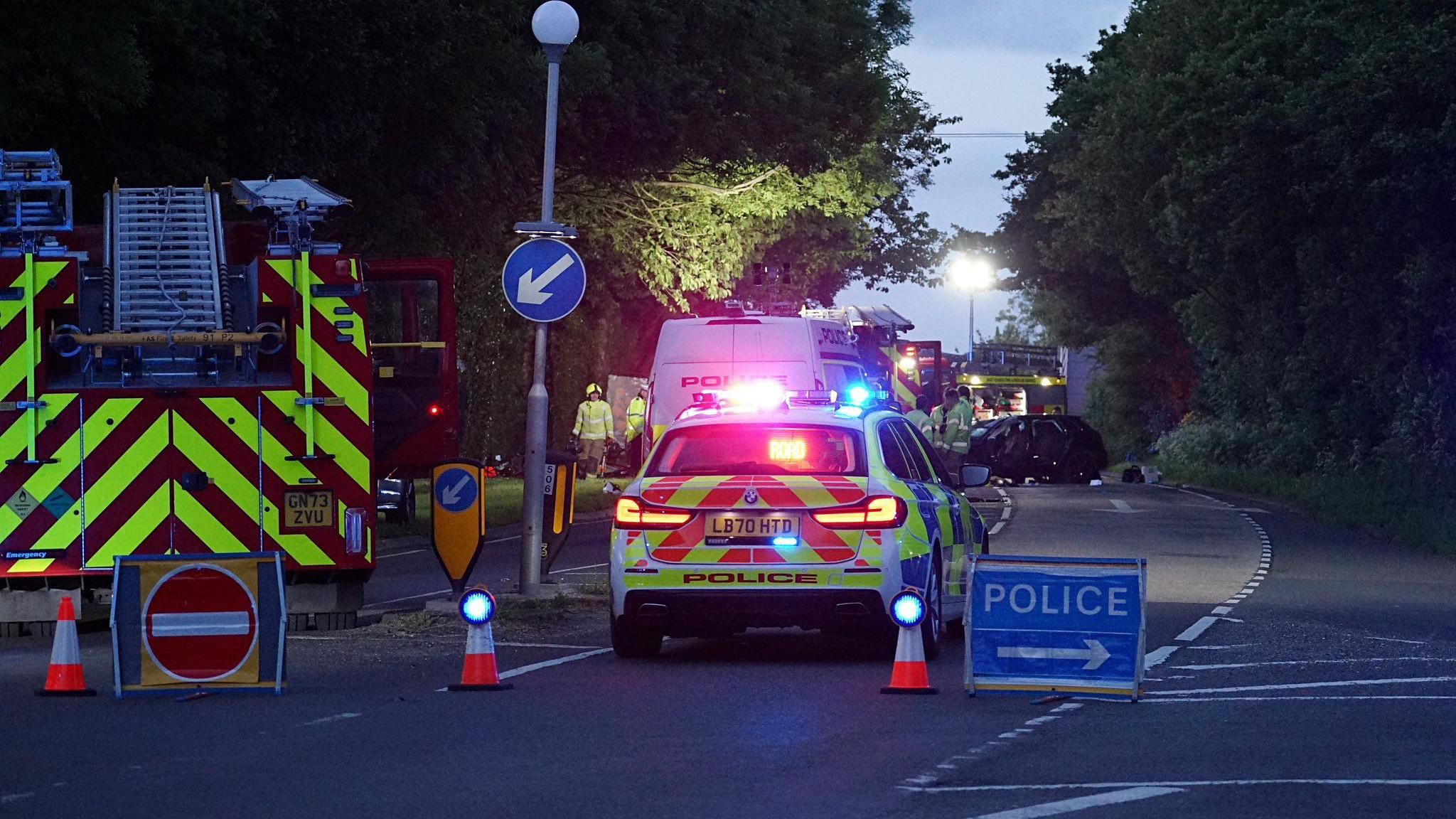 Emergency crews at the scene of a crash on the A26