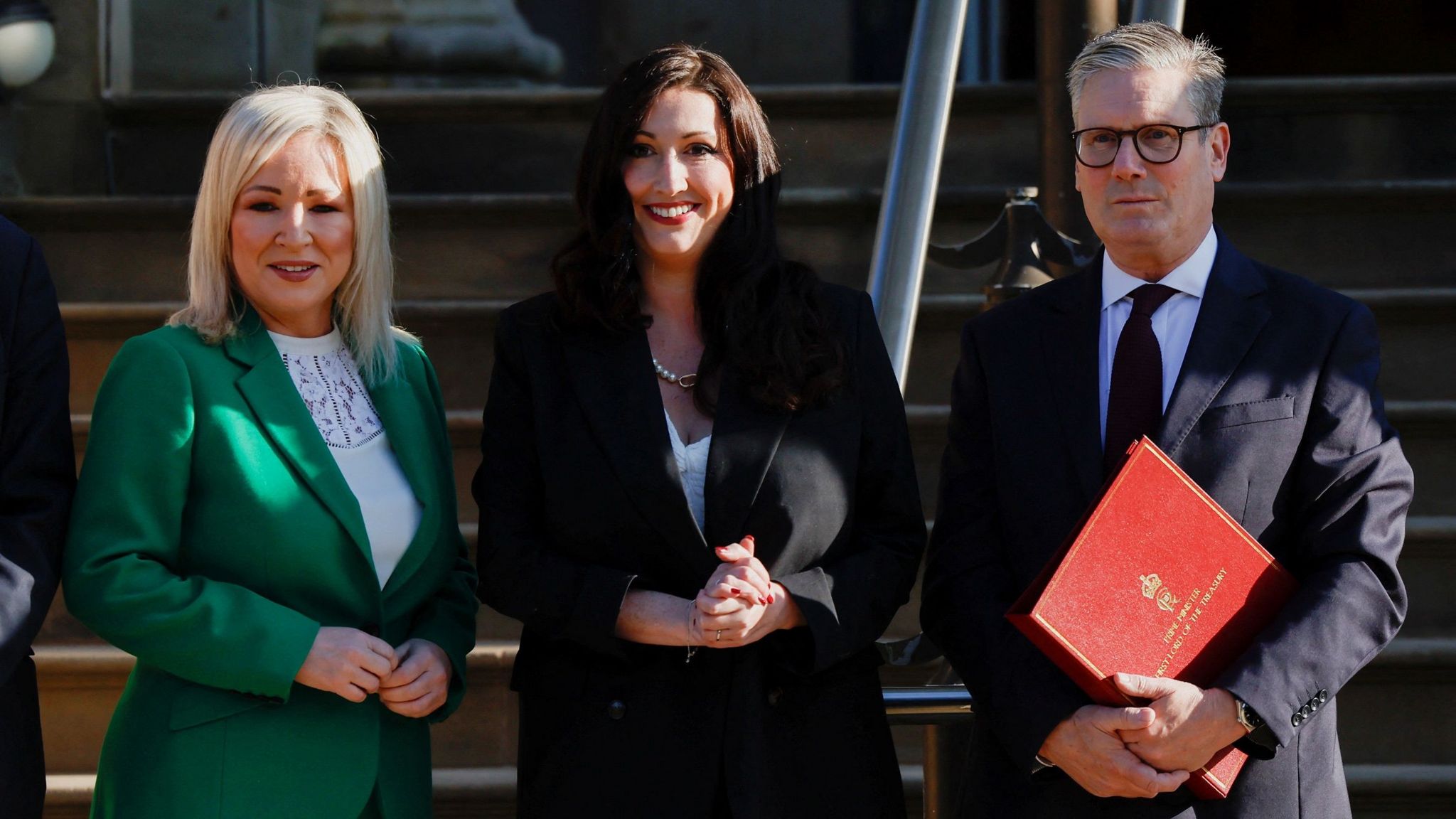 Michelle O'Neill, Emma Little-Pengelly and Sir Keir Starmer outside Stormont Castle