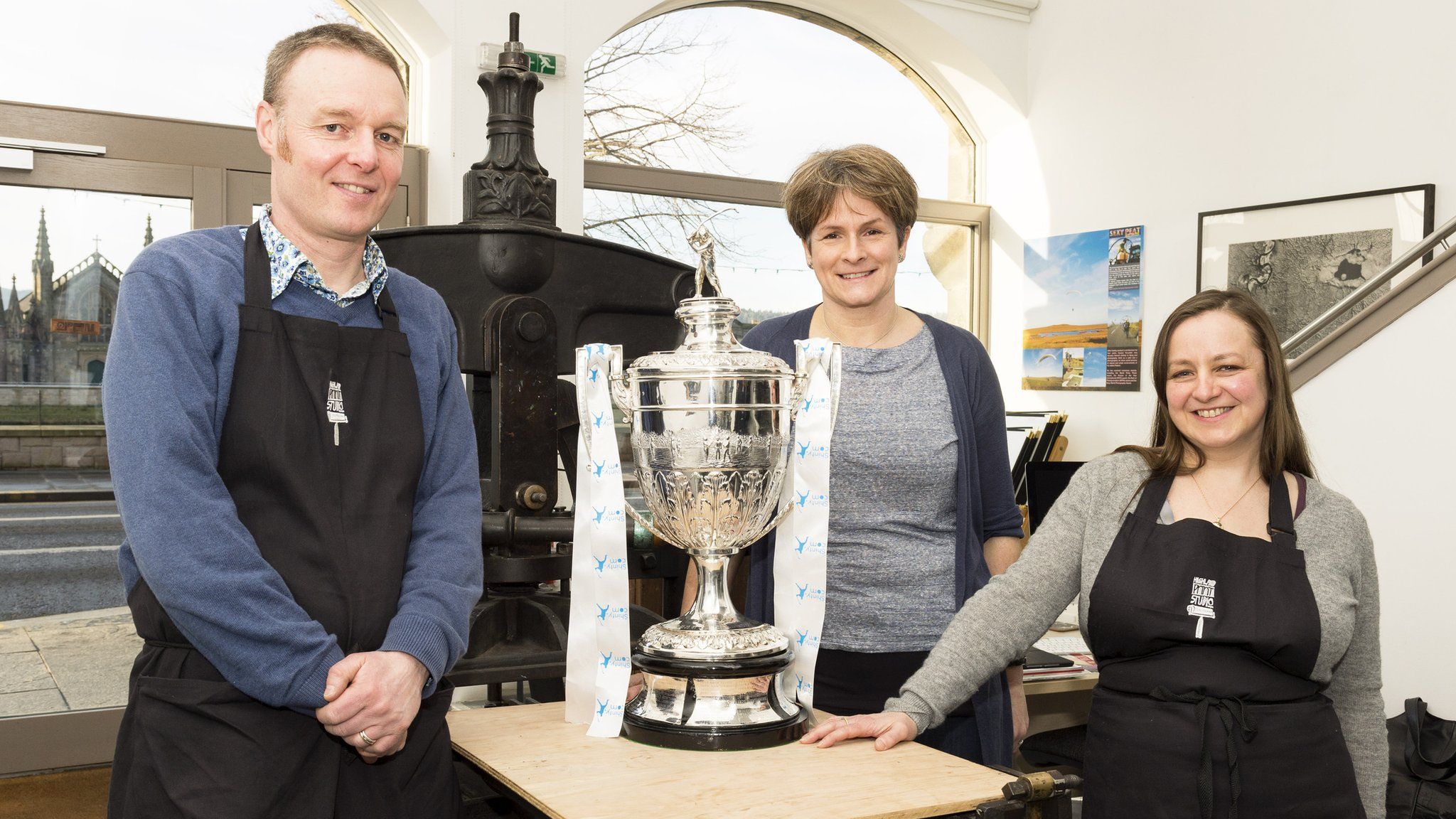 Highland Print Studio staff and artists with Camanachd Cup