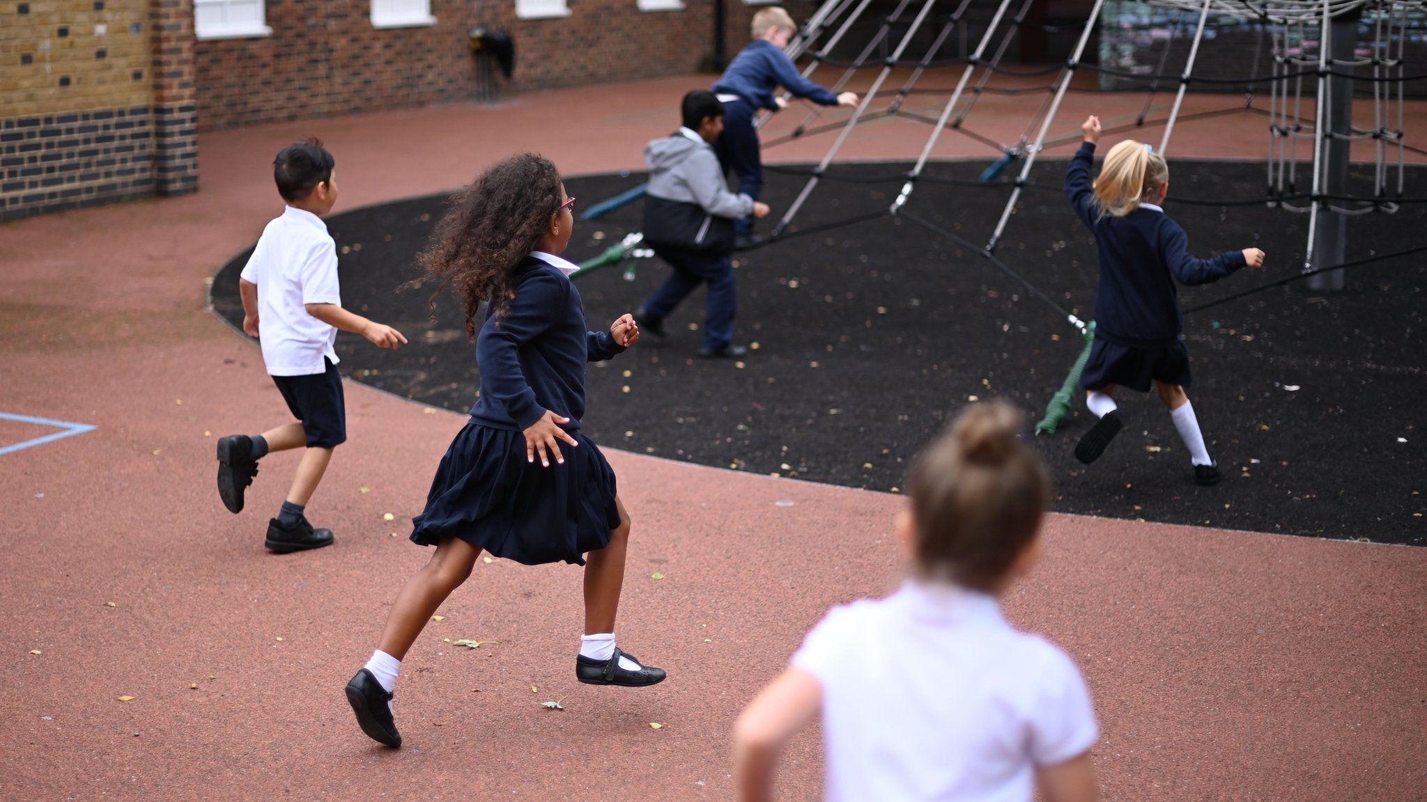 Children running on the playground