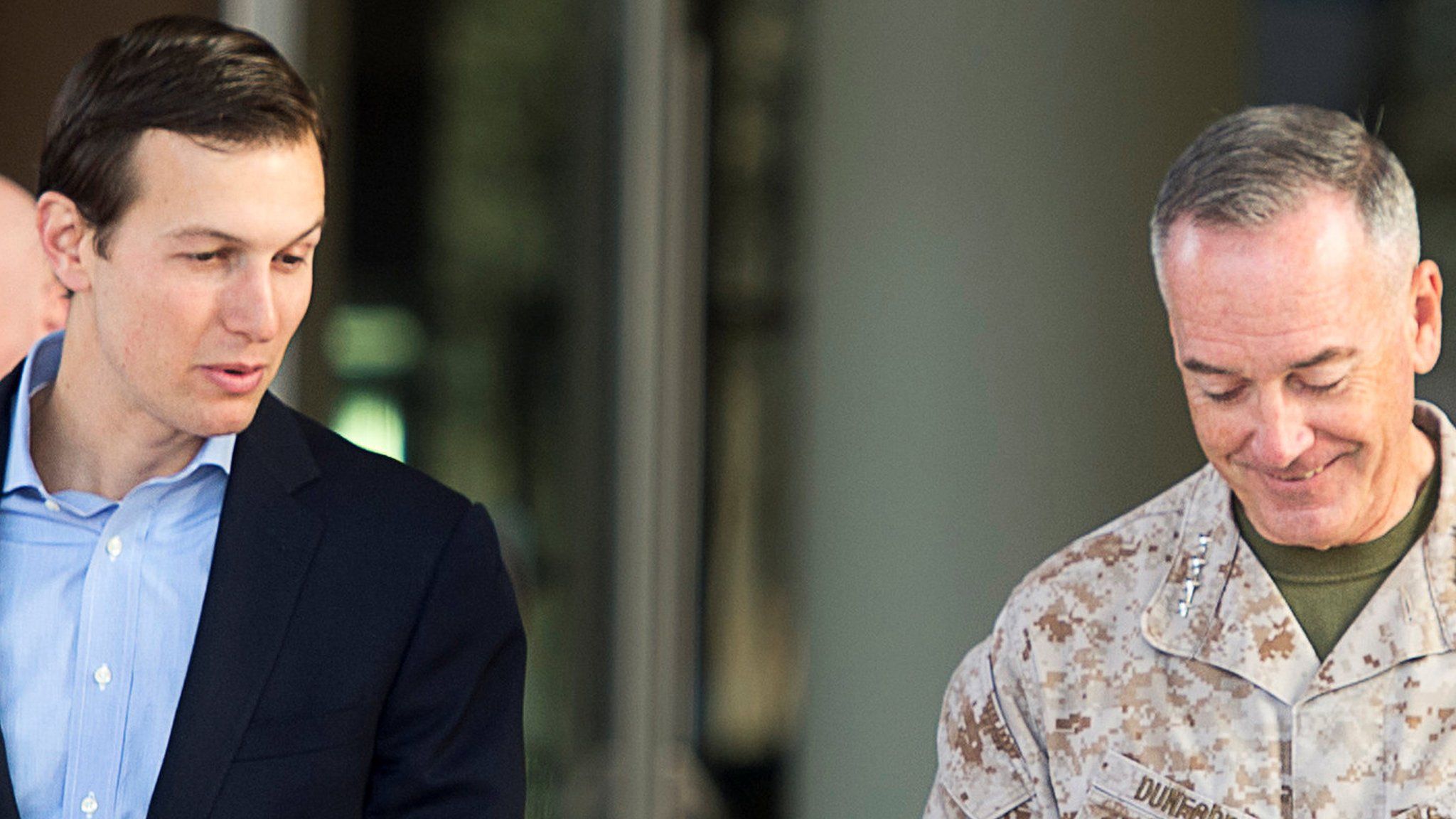 President Donald Trump's son-in-law and senior advisor Jared Kushner (L) speaks with Marine Corps General Joseph F Dunford Jr, chairman of the Joint Chiefs of Staff.