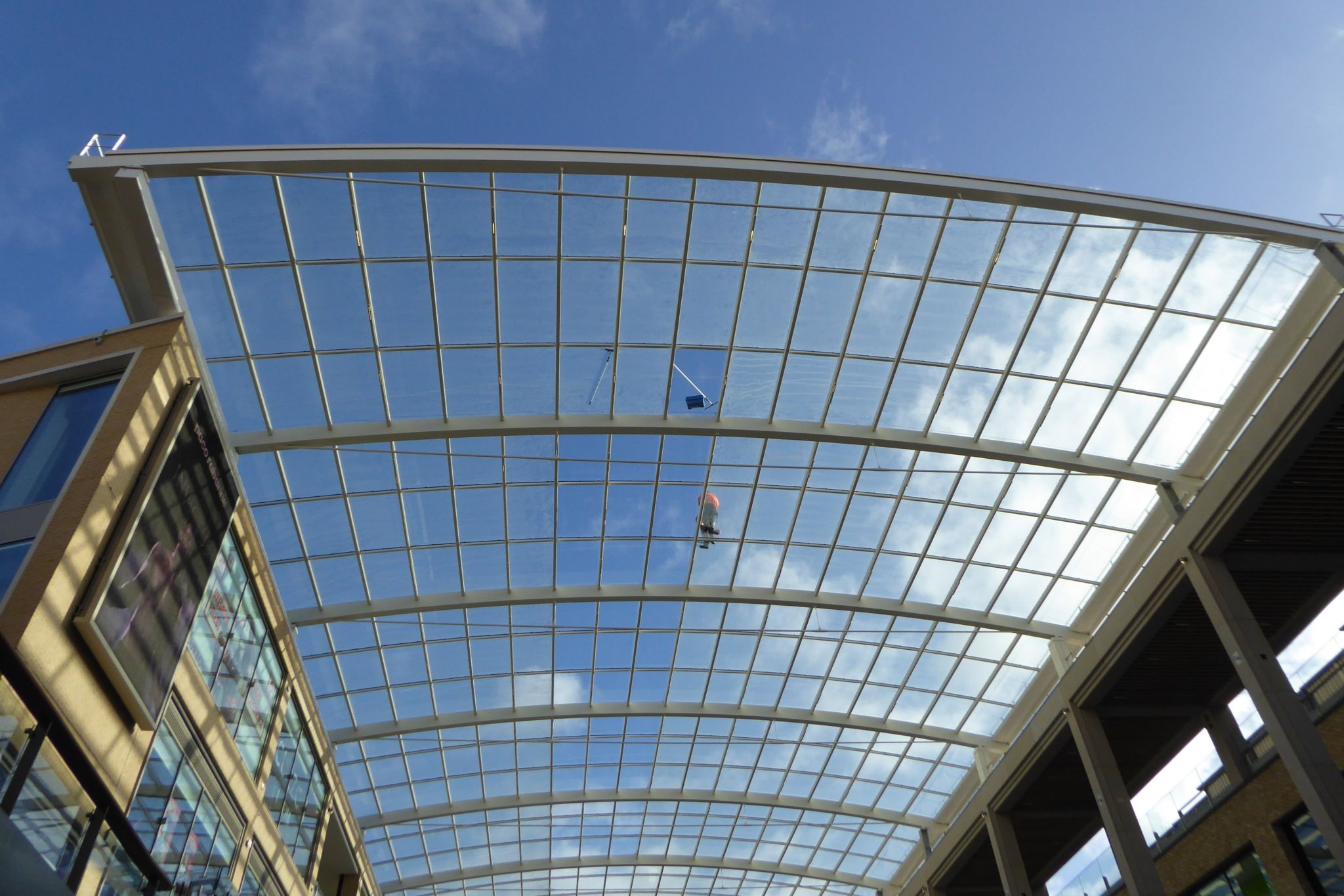 A window cleaner on the roof of the Westgate Shopping Centre