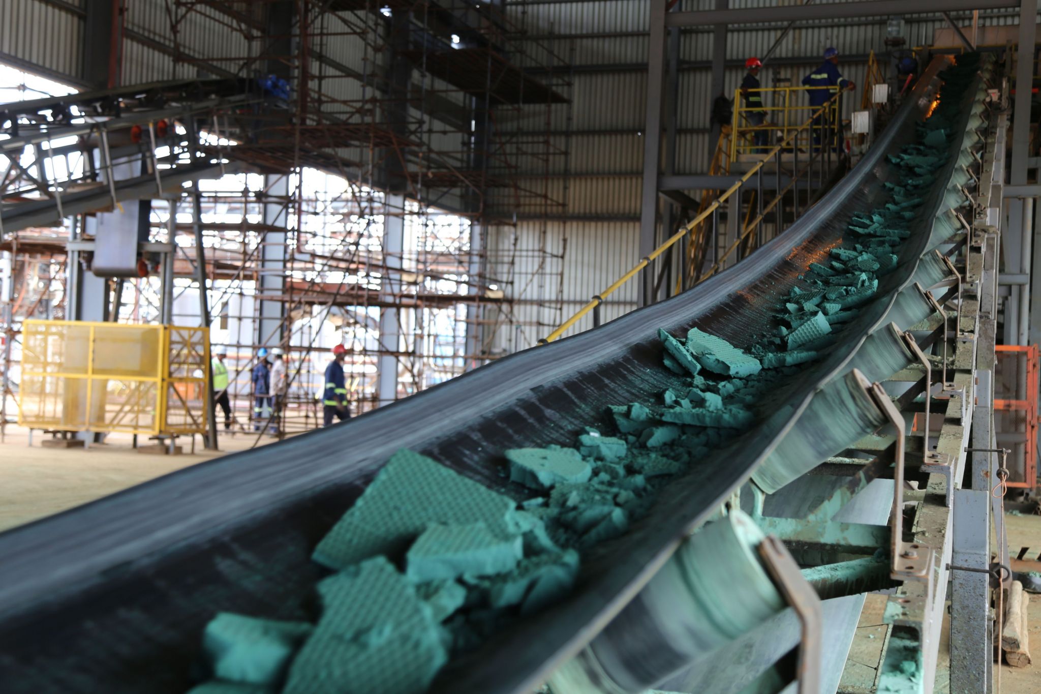 A conveyor belt carries chunks of Raw cobalt after a first transformation at a plant in Lubumbashi on February 16, 2018, before being exported, mainly to China, to be refined.