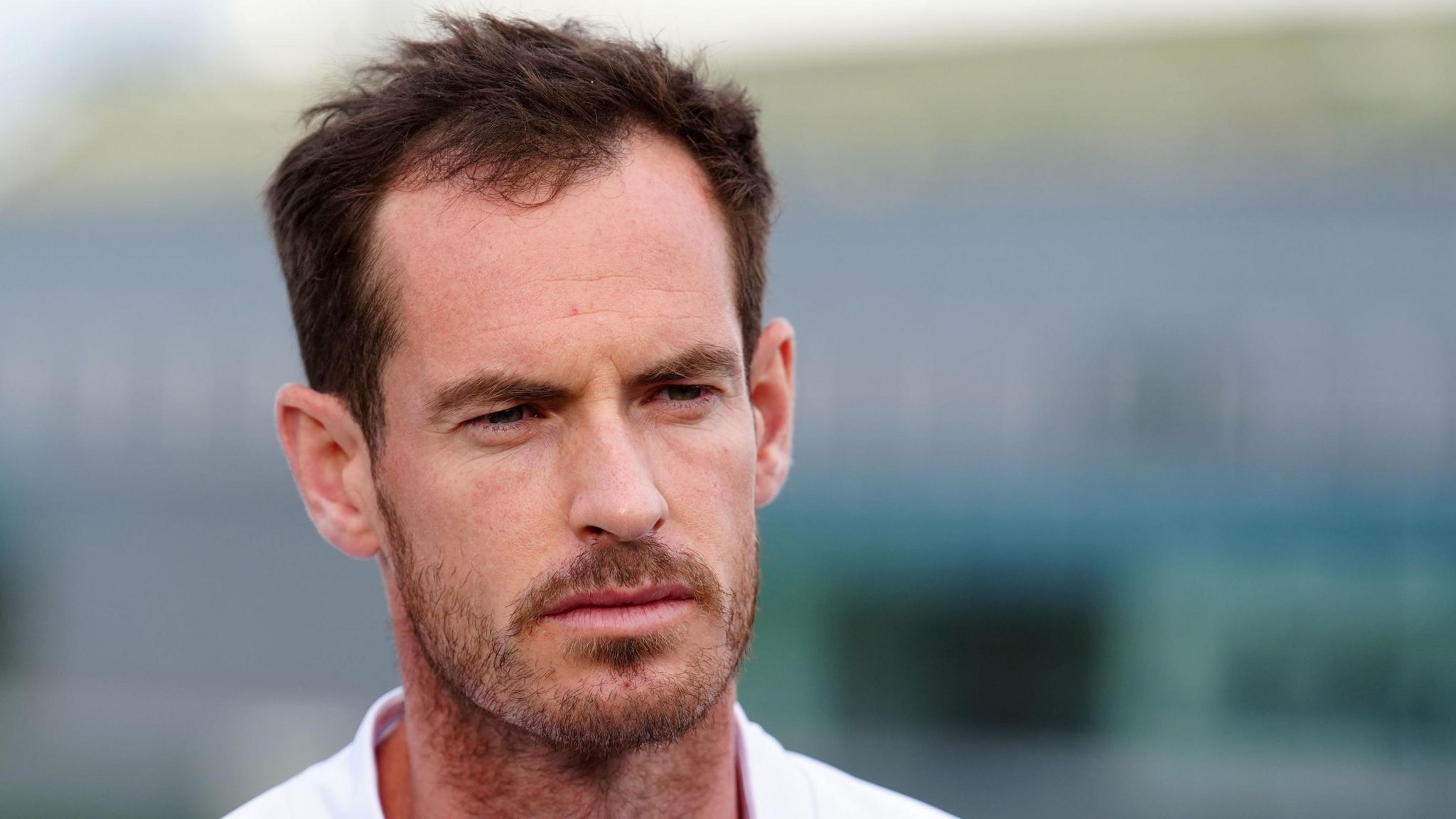 Andy Murray talks during a interview at Wimbledon