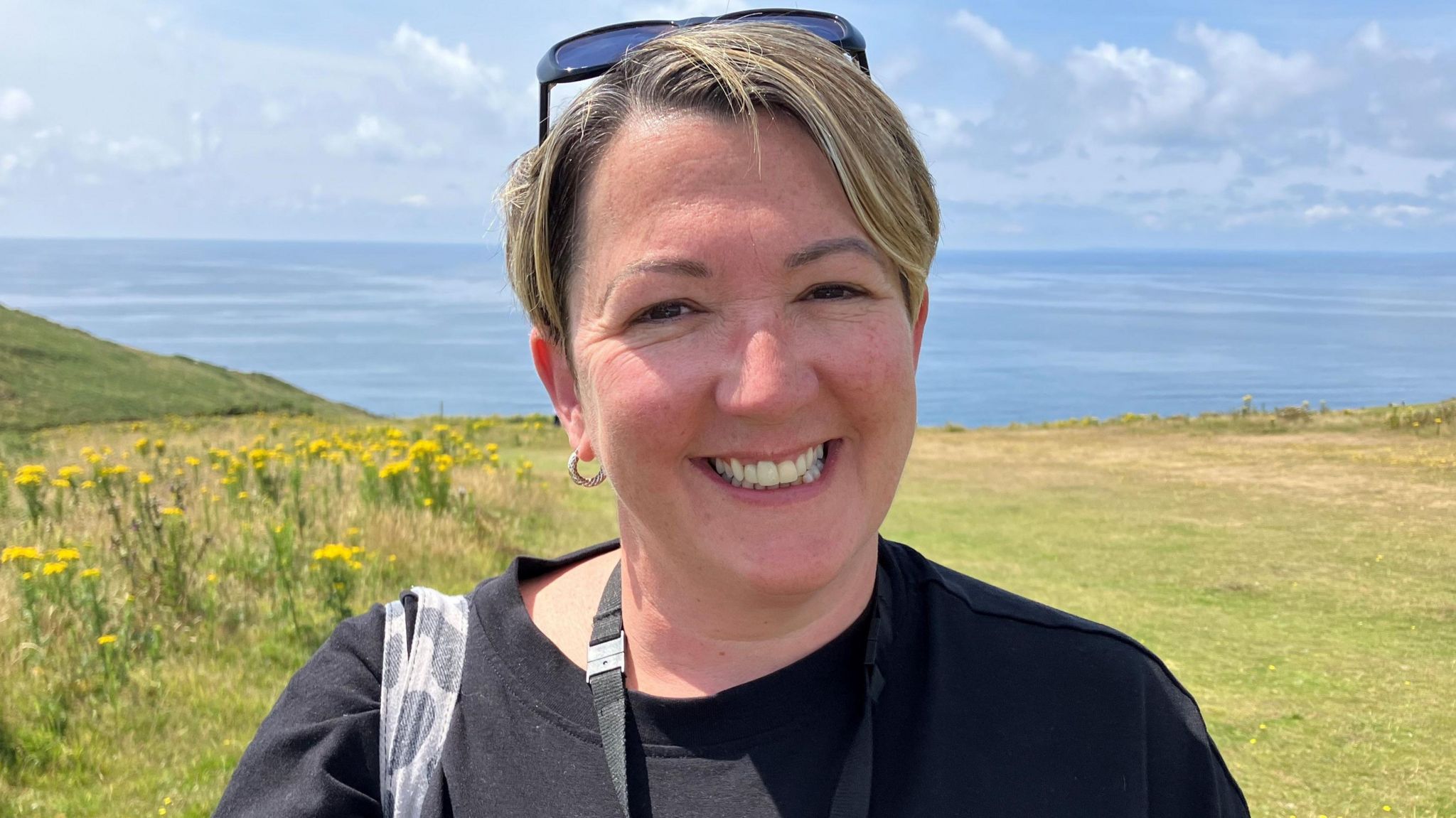 Woman standing at Rame Head