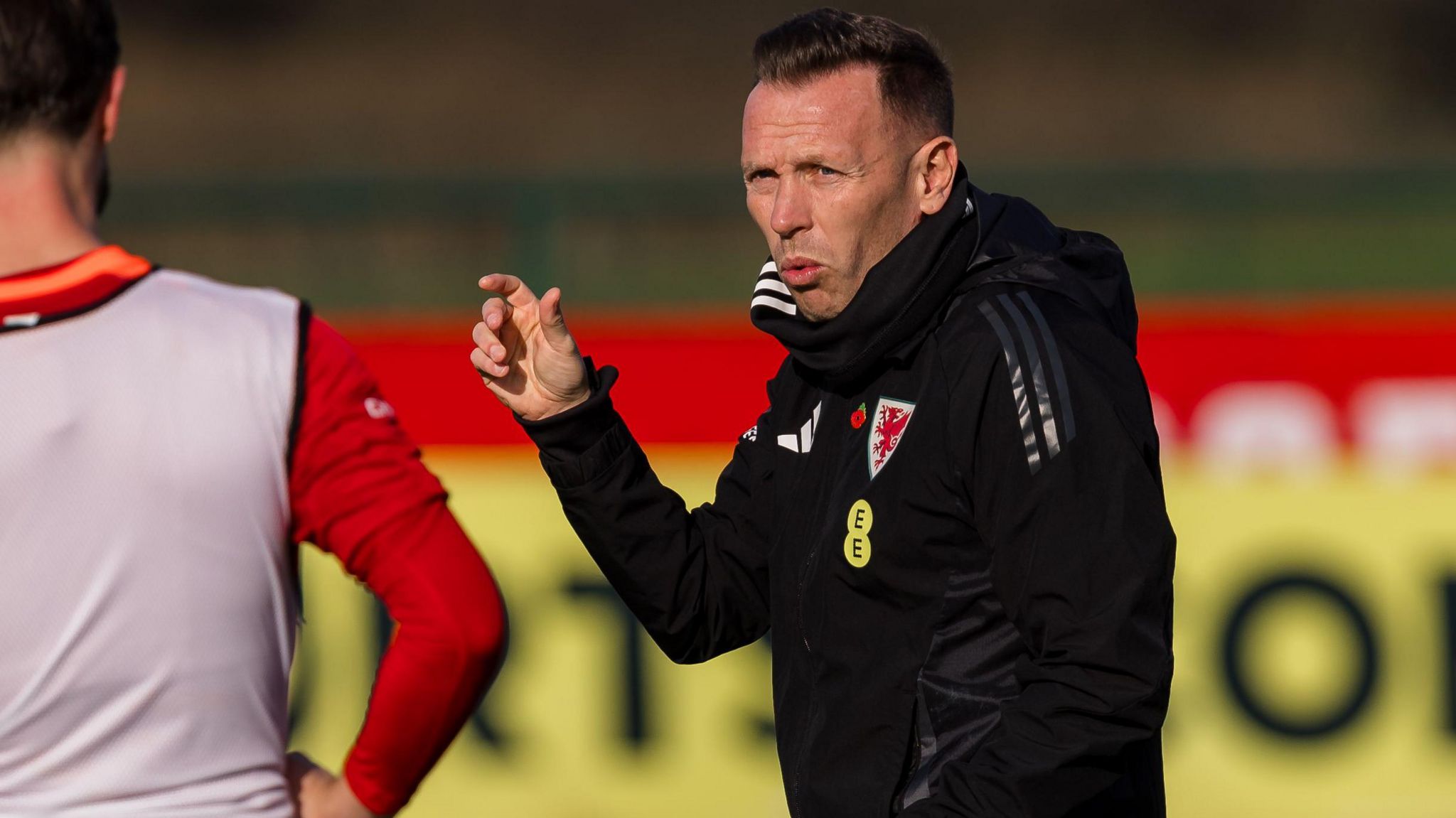 Craig Bellamy speaks during a training session